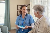 senior citizen with nurse