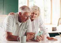 senior couple on phone